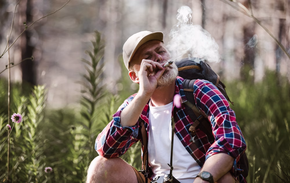 Bearded,Mature,Man,Smoking,Medical,Marijuana,In,Nature.